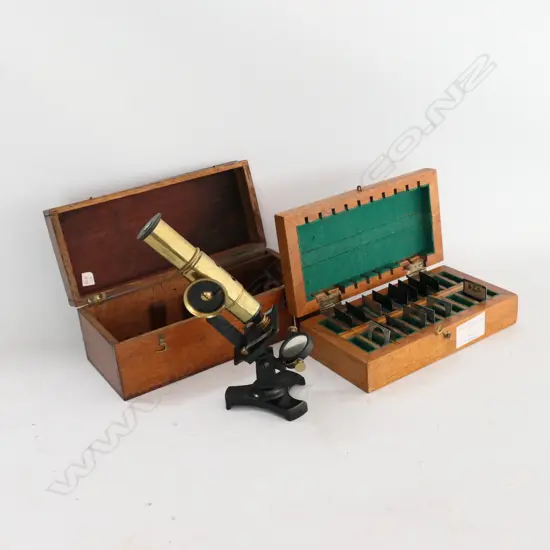 BOXED VINTAGE STUDENT'S MICROSCOPE AND BOX OF MICROSCOPE SLIDE CARRIERS & MIRRORS (2)
